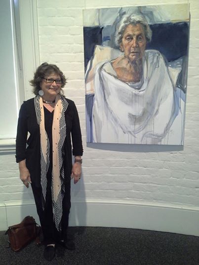Ann Cape with the portrait of her mother, at the Portia Geach Memorial Award 2014